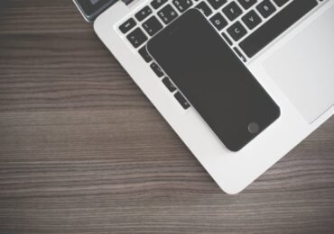 iPhone on MacBook Keyboard